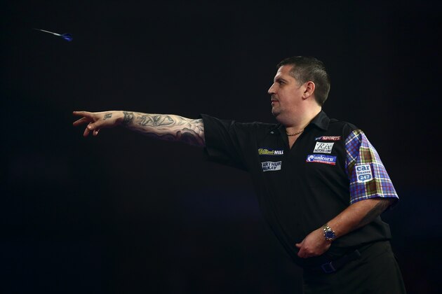 LONDON, ENGLAND - DECEMBER 29:  Gary Anderson of Scotland in action in his third round match against Vincent van der Voort of Holland on Day Eleven of the 2016 William Hill PDC World Darts Championships at Alexandra Palace on December 29, 2015 in London, England.  (Photo by Jordan Mansfield/Getty Images)