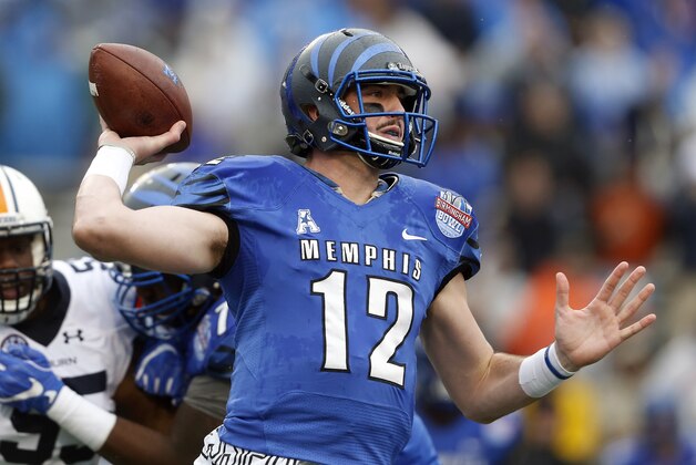 Memphis quarterback Paxton Lynch (12) throws a pass during the first half of the Birmingham Bowl NCAA college football game against Auburn Auburn, Wednesday, Dec. 30, 2015, in Birmingham, Ala. (AP Photo/Butch Dill)