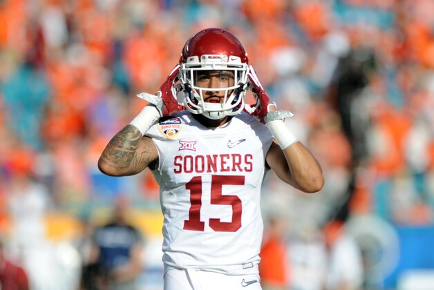 Dec 31, 2015; Miami Gardens, FL, USA; Oklahoma Sooners cornerback Zack Sanchez (15) prior to the 2015 CFP semifinal at the Orange Bowl against the Clemson Tigers at Sun Life Stadium. Mandatory Credit: Robert Duyos-USA TODAY Sports