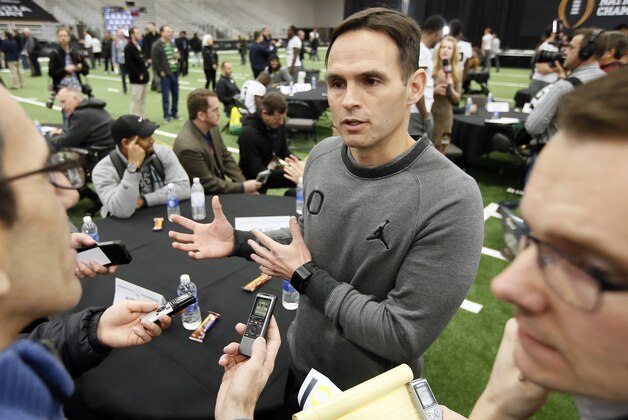 Oregon wide receivers coordinator Matt Lubick responds questions from reporters during media day for the NCAA college football playoff championship, Saturday, Jan. 10, 2015, in Dallas. Oregon is scheduled to play Ohio State on Monday. (AP Photo/Tony Gutierrez)