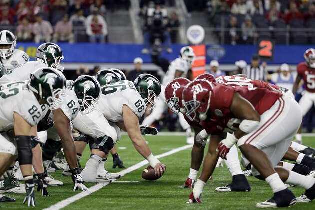Michigan State and Alabama line up during the second half of the Cotton Bowl NCAA college football semifinal playoff game, Thursday, Dec. 31, 2015, in Arlington, Texas. (AP Photo/Tony Gutierrez)