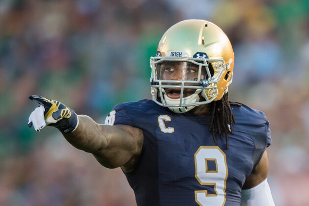 Sep 5, 2015; South Bend, IN, USA; Notre Dame Fighting Irish linebacker Jaylon Smith (9) signals in the first quarter against the Texas Longhorns at Notre Dame Stadium. Notre Dame won 38-3. Mandatory Credit: Matt Cashore-USA TODAY Sports