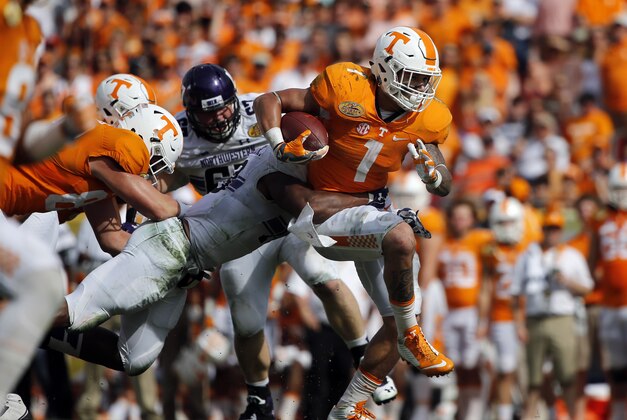 Jan 1, 2016; Tampa, FL, USA; Tennessee Volunteers running back Jalen Hurd (1) runs with the ball against the Northwestern Wildcats during the first half in the 2016 Outback Bowl at Raymond James Stadium. Mandatory Credit: Kim Klement-USA TODAY Sports Jan 1, 2016; Tampa, FL, USA; Tennessee Volunteers running back Jalen Hurd (1) runs with the ball against the Northwestern Wildcats during the first half in the 2016 Outback Bowl at Raymond James Stadium. Mandatory Credit: Kim Klement-USA TODAY Sports