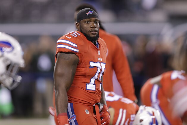 Buffalo Bills linebacker IK Enemkpali, center, stretches with teammates prior to an NFL football game against the New York Jets, Thursday, Nov. 12, 2015, in East Rutherford, N.J. (AP Photo/Seth Wenig)