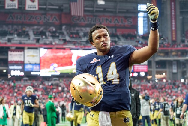Jan 1, 2016; Glendale, AZ, USA; NNotre Dame Fighting Irish quarterback DeShone Kizer (14) leaves the field following the 2016 Fiesta Bowl at University of Phoenix Stadium. The Ohio State Buckeyes defeated Notre Dame 44-28. Mandatory Credit: Matt Cashore-USA TODAY Sports