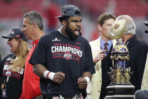 Ohio State running back Ezekiel Elliott celebrates after the Fiesta Bowl NCAA College football game against Notre Dame, Friday, Jan. 1, 2016, in Glendale, Ariz. Ohio State won 44-28. (AP Photo/Ross D. Franklin)
