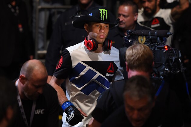 ORLANDO, FL - DECEMBER 19:   Donald Cerrone prepares to enter the Octagon before facing Rafael dos Anjos in their UFC lightweight title bout during the UFC Fight Night event at the Amway Center on December 19, 2015 in Orlando, Florida. (Photo by Josh Hedges/Zuffa LLC/Zuffa LLC via Getty Images)