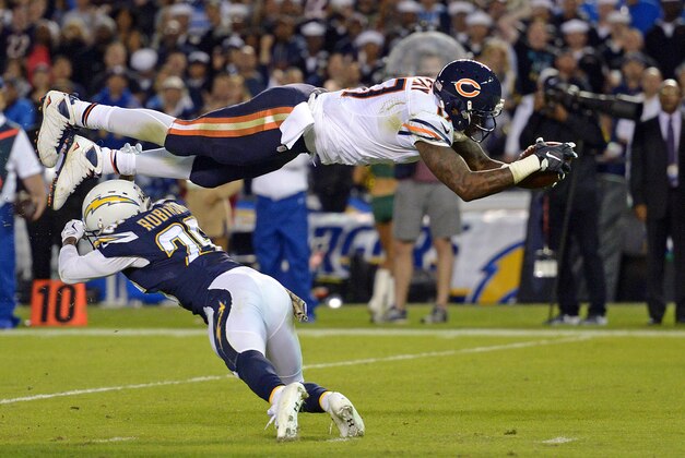 Nov 9, 2015; San Diego, CA, USA; Chicago Bears wide receiver Alshon Jeffery (17) is tackled by San Diego Chargers cornerback Patrick Robinson (26) during the second quarter at Qualcomm Stadium. Mandatory Credit: Jake Roth-USA TODAY Sports