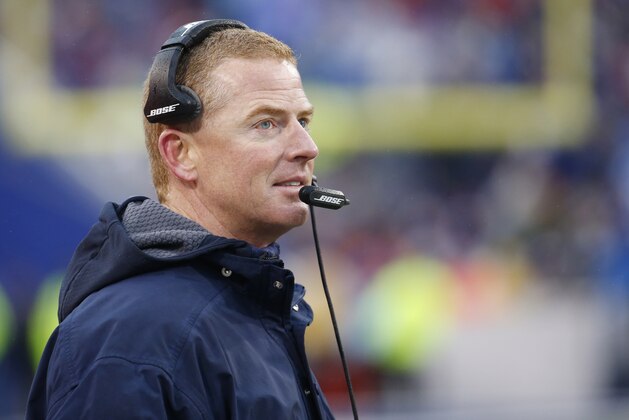 Dallas Cowboys head coach Jason Garrett looks on against the Buffalo Bills during the first half of an NFL football game, Sunday, Dec. 27, 2015, in Orchard Park, N.Y. (AP Photo/Bill Wippert)