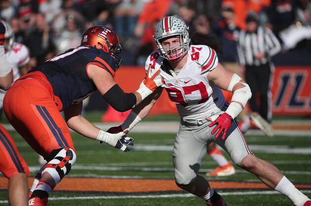 CHAMPAIGN, IL - NOVEMBER 14:  Joey Bosa #97 of the Ohio State Buckeyes rushes against Christian DiLauro #67 of the Illinois Fighting Illini at Memorial Stadium on November 14, 2015 in Champaign, Illinois.  (Photo by Jonathan Daniel/Getty Images)