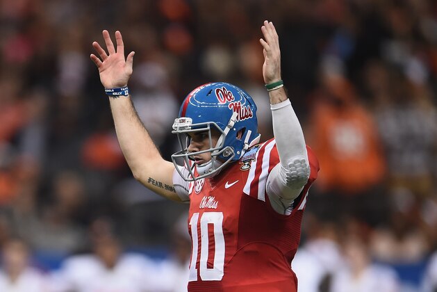 NEW ORLEANS, LA - JANUARY 01:  Quarterback Chad Kelly #10 of the Mississippi Rebels reacts to a touchdown against the Oklahoma State Cowboys during the third quarter of the Allstate Sugar Bowl at Mercedes-Benz Superdome on January 1, 2016 in New Orleans, Louisiana.  (Photo by Stacy Revere/Getty Images)