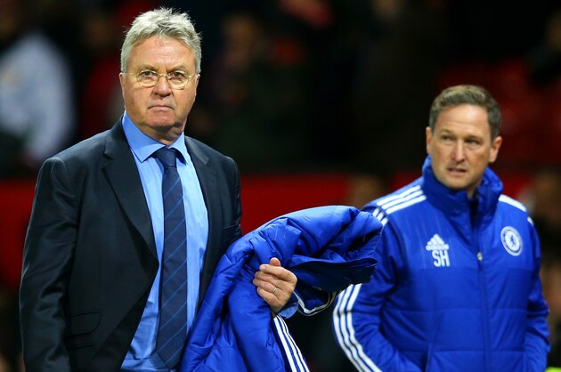 MANCHESTER, ENGLAND - DECEMBER 28:  Guus Hiddink, manager of Chelsea leaves the pitch next to assistant coach Steve Holland during the Barclays Premier League match between Manchester United and Chelsea at Old Trafford on December 28, 2015 in Manchester, England.  (Photo by Alex Livesey/Getty Images)