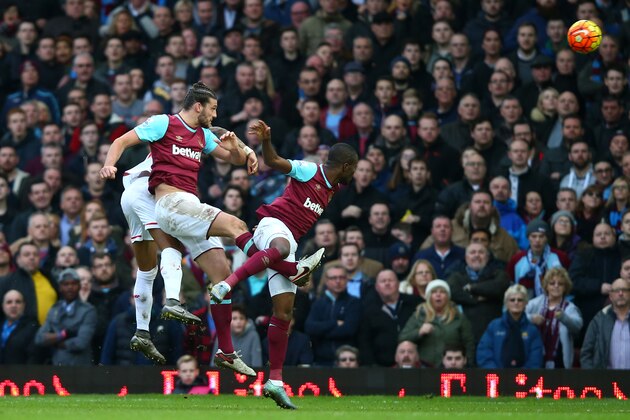 LONDON, ENGLAND - JANUARY 02: Andy Carroll (C) of West Ham United scores his team's second goal during the Barclays Premier League match between West Ham United and Liverpool at Boleyn Ground on January 2, 2016 in London, England.  (Photo by Clive Rose/Getty Images)