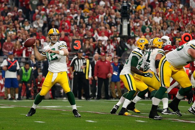 GLENDALE, AZ - DECEMBER 27:  Quarterback Aaron Rodgers #12 of the Green Bay Packers drops back to pass during the NFL game against the Arizona Cardinals at the University of Phoenix Stadium on December 27, 2015 in Glendale, Arizona.  The Cardinals defeated the Packers 38-8.  (Photo by Christian Petersen/Getty Images)