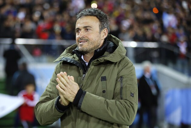 FC Barcelona's coach Luis Enrique arrives for the final match against River Plate at the FIFA Club World Cup soccer tournament in Yokohama, near Tokyo, Sunday, Dec. 20, 2015. (AP Photo/Shuji Kajiyama)