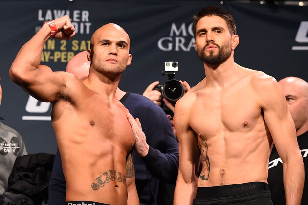 LAS VEGAS, NV - JANUARY 01:   (L-R) UFC welterweight champion Robbie Lawler and opponent Carlos Condit pose for photos during the UFC 195 weigh-in at the MGM Grand Conference Center on January 1, 2016 in Las Vegas, Nevada. (Photo by Josh Hedges/Zuffa LLC/Zuffa LLC via Getty Images)