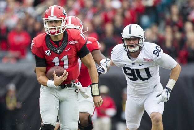 Jan 2, 2016; Jacksonville, FL, USA; Georgia Bulldogs quarterback Greyson Lambert (11) runs with the football during the first quarter against the Penn State Nittany Lions at EverBank Field. Mandatory Credit: Logan Bowles-USA TODAY Sports