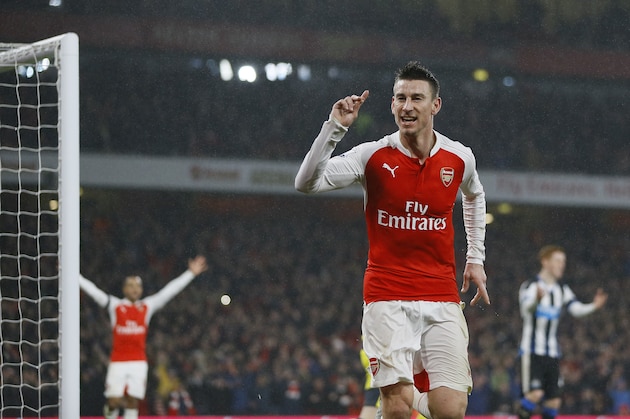 Arsenal's Laurent Koscielny celebrates scoring a goal during the English Premier League soccer match between Arsenal and Newcastle United at Emirates stadium in London, Saturday, Jan. 2, 2016. (AP Photo/Kirsty Wigglesworth)