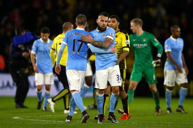 WATFORD, ENGLAND - JANUARY 02:  Nicolas Otamendi of Manchester City embraces Kevin de Bruyne of Manchester City following their side's victory during the Barclays Premier League match between Watford and Manchester City at Vicarage Road on January 2, 2016 in Watford, England.  (Photo by Ian Walton/Getty Images)