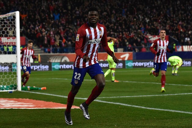 Atletico Madrid's Ghanaian midfielder Thomas Partey celebrates after scoring during the Spanish league football match Club Atletico de Madrid vs Leg vante UD at the Vicente Calderon stadium in Madrid on January 2, 2016.   AFP PHOTO/ GERARD JULIEN / AFP / GERARD JULIEN        (Photo credit should read GERARD JULIEN/AFP/Getty Images)