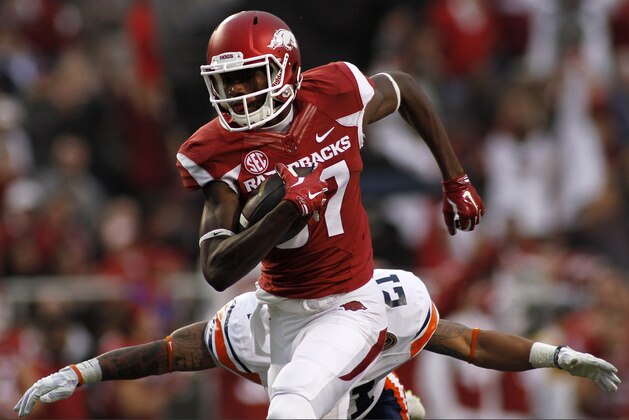 Arkansas' Dominique Reed (87) outruns Tennessee-Martin's Jordan Landry (21) during a 71-yard touchdown play in the second half of an NCAA college football game against Saturday, Oct. 31, 2015, in Fayetteville, Ark. (AP Photo/Samantha Baker)