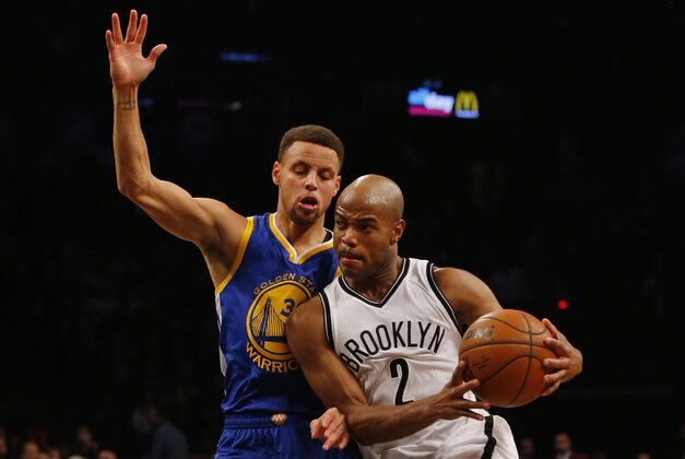 Dec 6, 2015; Brooklyn, NY, USA; Golden State Warriors guard Stephen Curry (30) defends against Brooklyn Nets guard Jarrett Jack (2)  during the second half at Barclays Center. The Golden State Warriors defeated the Brooklyn Nets 114-98. Mandatory Credit: Noah K. Murray-USA TODAY Sports