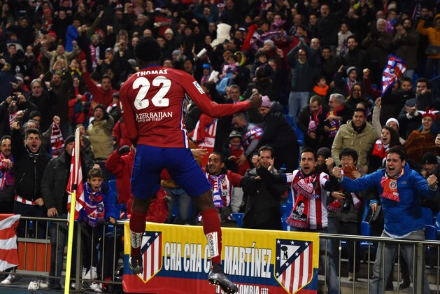 Atletico Madrid's Ghanaian midfielder Thomas Partey celebrates after scoring during the Spanish league football match Club Atletico de Madrid vs Leg vante UD at the Vicente Calderon stadium in Madrid on January 2, 2016.   AFP PHOTO/ GERARD JULIEN / AFP / GERARD JULIEN        (Photo credit should read GERARD JULIEN/AFP/Getty Images)