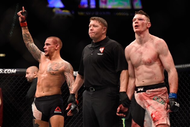 LAS VEGAS, NV - JANUARY 02: Dustin Poirier (left) and Joe Duffy of Ireland (right) await the final decision in their lightweight bout during the UFC 195 event inside MGM Grand Garden Arena on January 2, 2016 in Las Vegas, Nevada.  (Photo by Jeff Bottari/Zuffa LLC/Zuffa LLC via Getty Images)