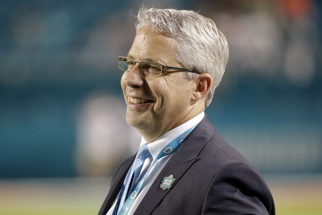 Miami Dolphins general manager Dennis Hickey on the field before an NFL football game against the New York Giants, Monday, Dec. 14, 2015, in Miami Gardens, Fla.  (AP Photo/Wilfredo Lee)