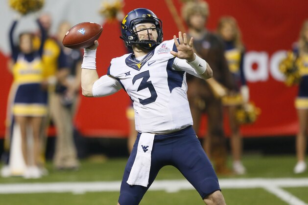 West Virginia quarterback Skyler Howard (3) throws against Arizona State during the first half of the Cactus Bowl NCAA college football game, Saturday, Jan. 2, 2016, in Phoenix. (AP Photo/Matt York)