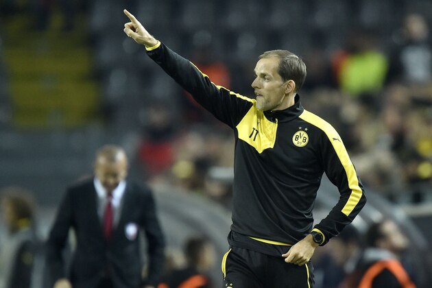 Dortmund head coach Thomas Tuchel shows the way during the Europa League group C soccer match between Borussia Dortmund and Qabala FC in Dortmund, Germany, Thursday, Nov. 5, 2015. (AP Photo/Martin Meissner)