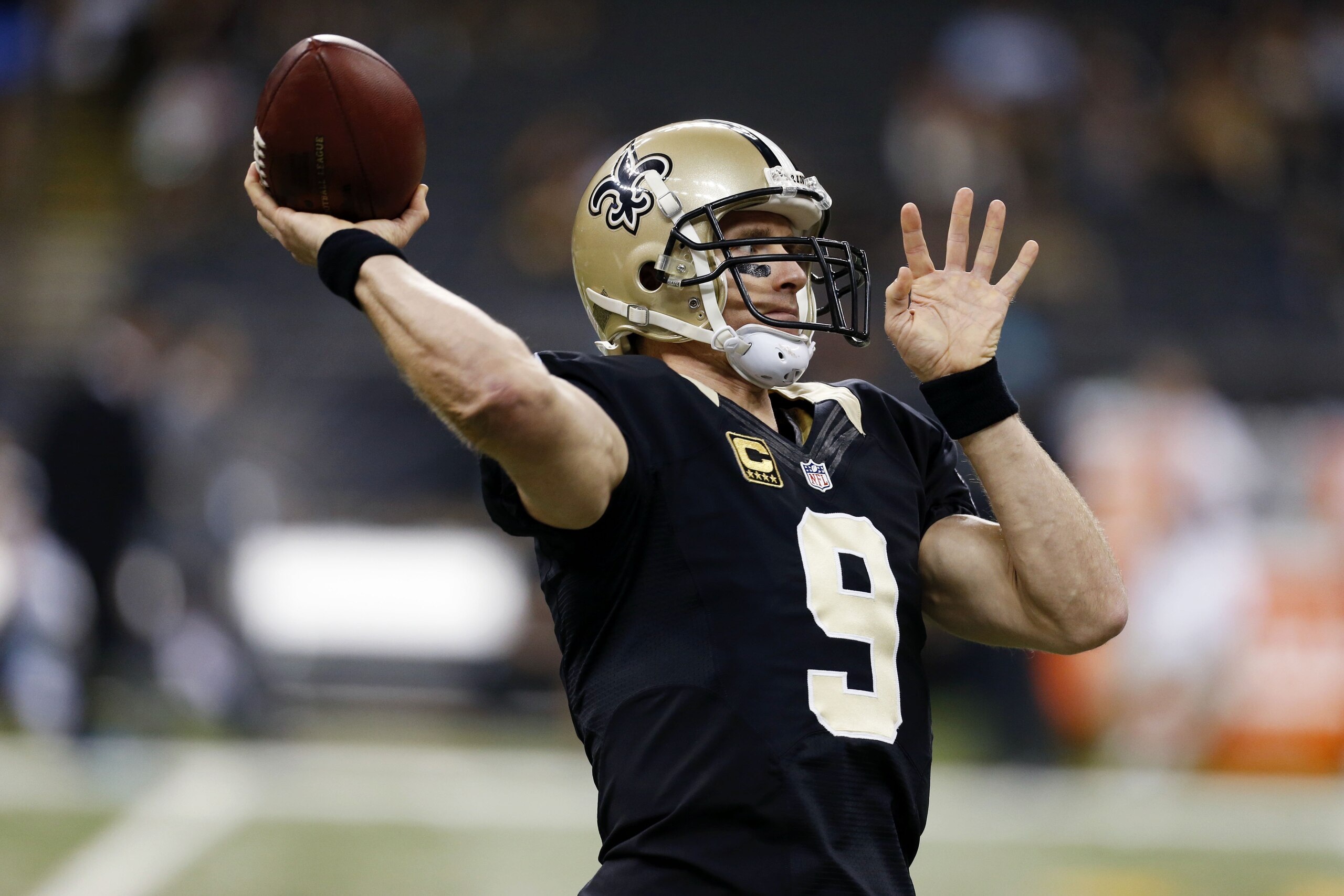 New Orleans Saints quarterback Drew Brees (9) warms up before an NFL football game against the Jacksonville Jaguars in New Orleans, Sunday, Dec. 27, 2015. (AP Photo/Jonathan Bachman) New Orleans Saints quarterback Drew Brees (9) warms up before an NFL football game against the Jacksonville Jaguars in New Orleans, Sunday, Dec. 27, 2015. (AP Photo/Jonathan Bachman)