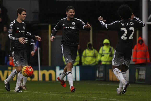 Chelsea's Brazilian-born Spanish striker Diego Costa (C) celebrates scoring his team's third goal with Chelsea's Brazilian midfielder Oscar (L) and Chelsea's Brazilian midfielder Willian during the English Premier League football match between Crystal Palace and Chelsea at Selhurst Park in south London on January 3, 2016. AFP PHOTO / ADRIAN DENNIS

RESTRICTED TO EDITORIAL USE. NO USE WITH UNAUTHORIZED AUDIO, VIDEO, DATA, FIXTURE LISTS, CLUB/LEAGUE LOGOS OR 'LIVE' SERVICES. ONLINE IN-MATCH USE LIMITED TO 75 IMAGES, NO VIDEO EMULATION. NO USE IN BETTING, GAMES OR SINGLE CLUB/LEAGUE/PLAYER PUBLICATIONS. / AFP / ADRIAN DENNIS        (Photo credit should read ADRIAN DENNIS/AFP/Getty Images)