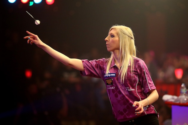 FRIMLEY, ENGLAND - JANUARY 10: Fallon Sherrock of England in action during her the women's final against Lisa Ashton of England during the BDO Lakeside World Professional Darts Championships on Day Eight at The Lakeside Country Club on January 10, 2015 in Frimley, England. (Photo by Charlie Crowhurst/Getty Images)