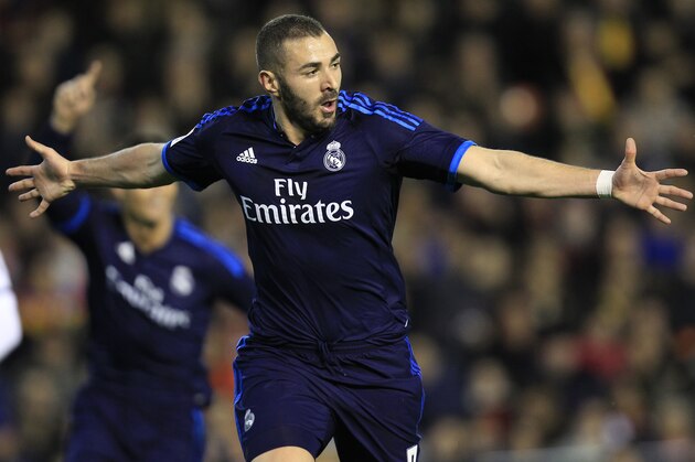 Real Madrid's Karim Benzema celebrates after scoring against Valencia during a Spanish La Liga soccer match at the Mestalla stadium in Valencia, Spain, Sunday, Jan. 3, 2016. (AP Photo/Alberto Saiz) Real Madrid's Karim Benzema celebrates after scoring against Valencia during a Spanish La Liga soccer match at the Mestalla stadium in Valencia, Spain, Sunday, Jan. 3, 2016. (AP Photo/Alberto Saiz)