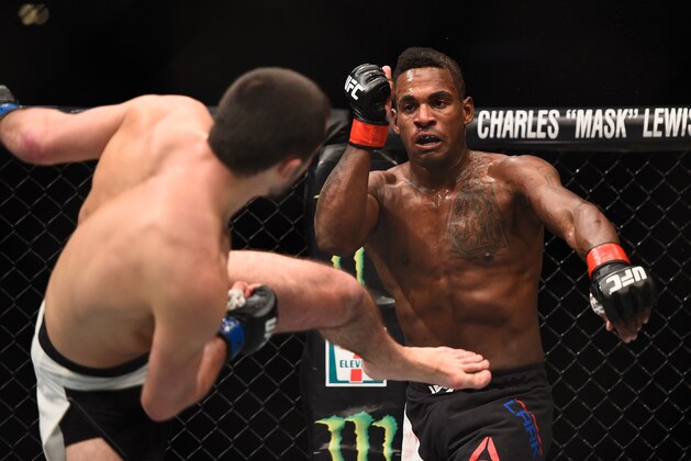 LAS VEGAS, NV - JANUARY 02: (L-R) Albert Tumenov of Russia kicks Lorenz Larkin in their welterweight bout during the UFC 195 event inside MGM Grand Garden Arena on January 2, 2016 in Las Vegas, Nevada.  (Photo by Jeff Bottari/Zuffa LLC/Zuffa LLC via Getty Images)