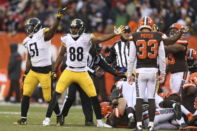 Pittsburgh Steelers inside linebacker Sean Spence (51) and wide receiver Darrius Heyward-Bey (88) signal a first down after the Cleveland Browns fumbled the kickoff and Pittsburgh recovered during the second half of an NFL football game, Sunday, Jan. 3, 2016, in Cleveland. (AP Photo/Ron Schwane)