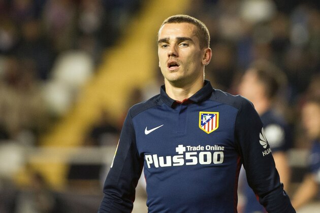 Atletico Madrid's French forward Antoine Griezmann looks on during the Spanish league football match Rayo Vallecano de Madrid vs Club Atletico de Madrid at Vallecas stadium in Madrid on December 30, 2015.   AFP PHOTO/ CURTO DE LA TORRE / AFP / CURTO DE LA TORRE        (Photo credit should read CURTO DE LA TORRE/AFP/Getty Images)