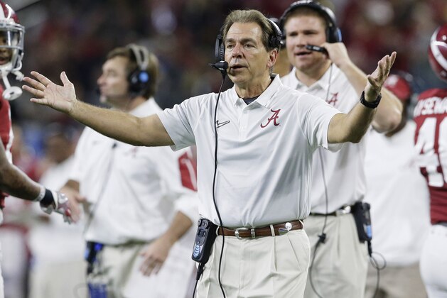 Alabama head coach Nick Saban cheers his players during the second half of the Cotton Bowl NCAA college football semifinal playoff game against Michigan State, Thursday, Dec. 31, 2015, in Arlington, Texas. (AP Photo/LM Otero)