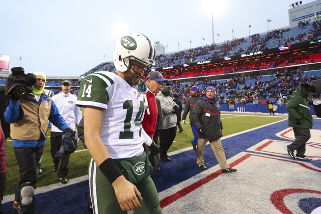 New York Jets quarterback Ryan Fitzpatrick (14) leaves the field after an NFL football game against the Buffalo Bills Sunday, Jan. 3, 2016, in Orchard Park, N.Y. The Bills won 22-17. (AP Photo/Bill Wippert)