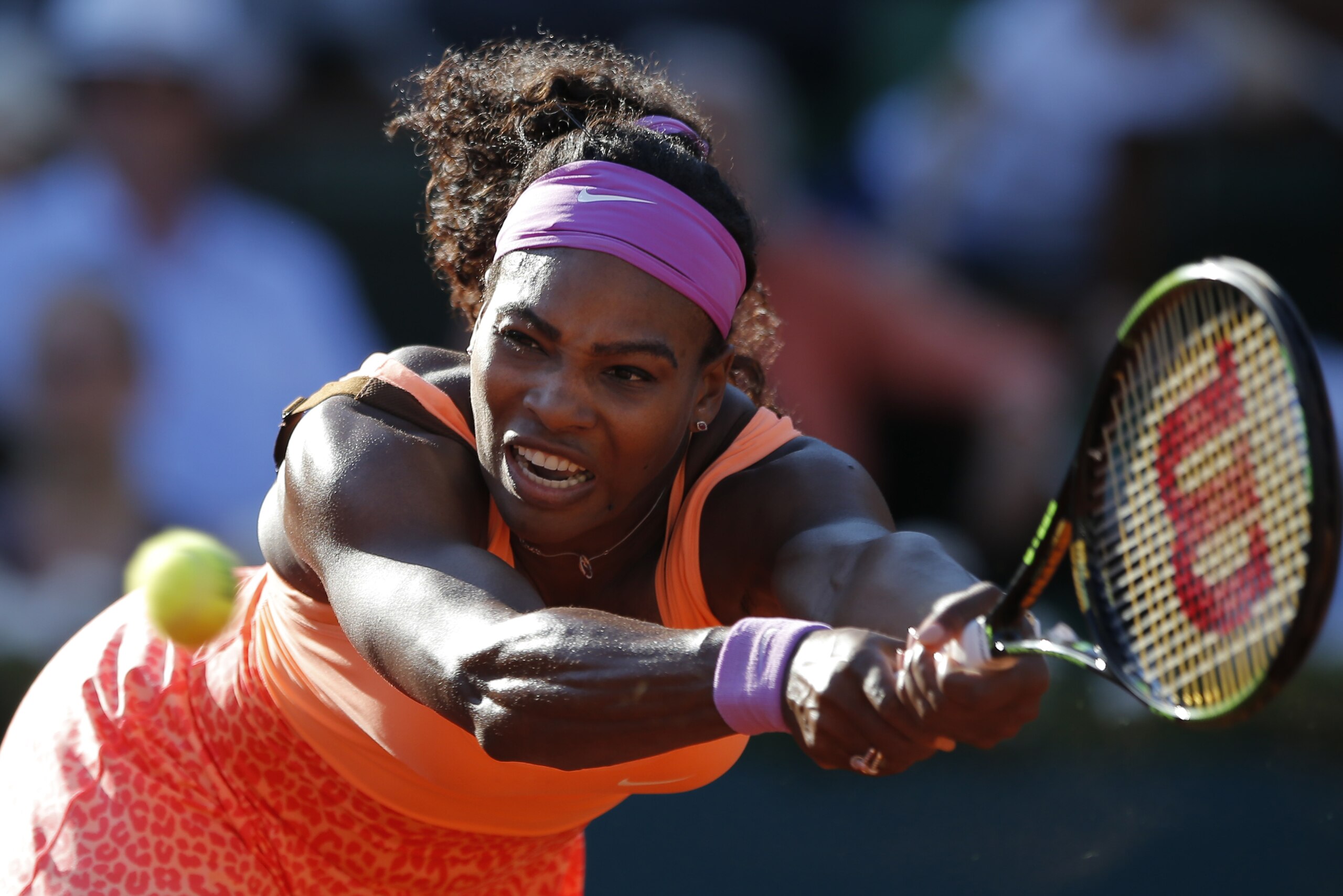 FILE - In this June 4, 2015, file photo, Serena Williams, of the United States, returns a shot in her semifinal match of the French Open tennis tournament against Timea Bacsinszky, of Switzerland, at the Roland Garros stadium in Paris. For the fourth time, Williams has been named The Associated Press Female Athlete of the Year. (AP Photo/Francois Mori, File)
