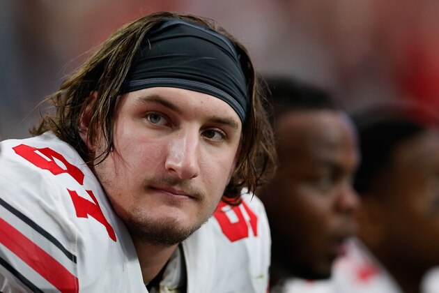 GLENDALE, AZ - JANUARY 01:  Defensive lineman Joey Bosa #97 of the Ohio State Buckeyes sits on the sideline during the first quarter of the BattleFrog Fiesta Bowl against the Notre Dame Fighting Irish at University of Phoenix Stadium on January 1, 2016 in Glendale, Arizona.  The Buckeyes defeated the Fighting Irish 44-28.  (Photo by Christian Petersen/Getty Images)