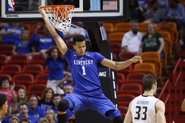 MIAMI, FL - NOVEMBER 27: Skal Labissiere of the Kentucky Wildcats hangs on the basket after being fouled on the way up by the South Florida Bulls on November 27, 2015 at the American Airlines Arena in Miami, Florida. Kentucky defeated South Florida 84-63. (Photo by Joel Auerbach/Getty Images)