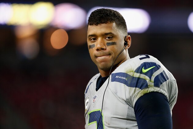 GLENDALE, AZ - JANUARY 03:  Quarterback Russell Wilson #3 of the Seattle Seahawks stands on the sidelines during the fourth quarter of the NFL game against the Arizona Cardinals at the University of Phoenix Stadium on January 3, 2016 in Glendale, Arizona. The Seahawks defeated the Cardinals 36-6.  (Photo by Christian Petersen/Getty Images)