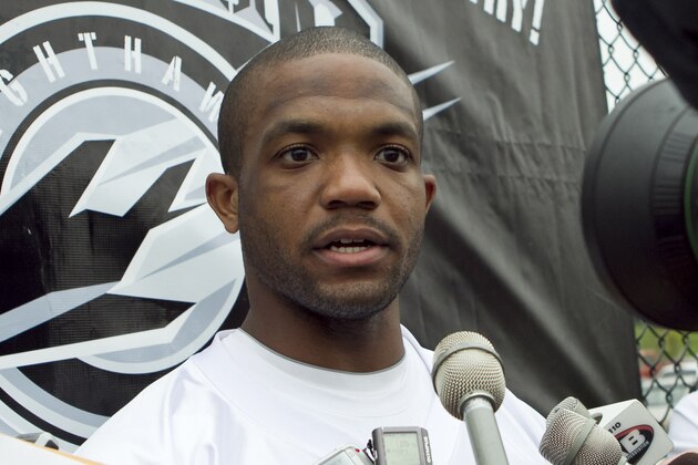 FILE - This Sept. 1, 2010, file photo shows former Ohio State football player Maurice Clarett speaking to reporters following team practice with the United Football League's Omaha Nighthawks, in Omaha, Neb.  Clarett blames athletes rather than coaches and boosters for the culture that created problems in the Buckeyes' football program. Clarett also questioned the foundation of big-time college football, where universities make millions off athletes yet the players get in trouble for accepting small amounts of cash, during an interview Wednesday, June 8, 201,  on The Dan Patrick Show.(AP Photo/Nati Harnik, File)