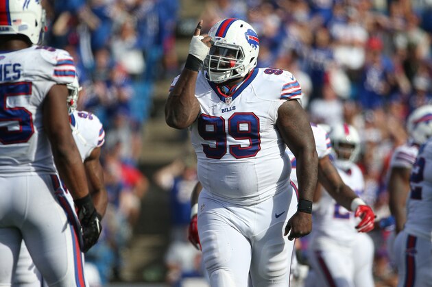 ORCHARD PARK, NY - SEPTEMBER 20: Marcell Dareus #99 of the Buffalo Bills celebrates after the Bills recovered a fumble during NFL game action against the New England Patriots at Ralph Wilson Stadium on September 20, 2015 in Orchard Park, New York. (Photo by Tom Szczerbowski/Getty Images)