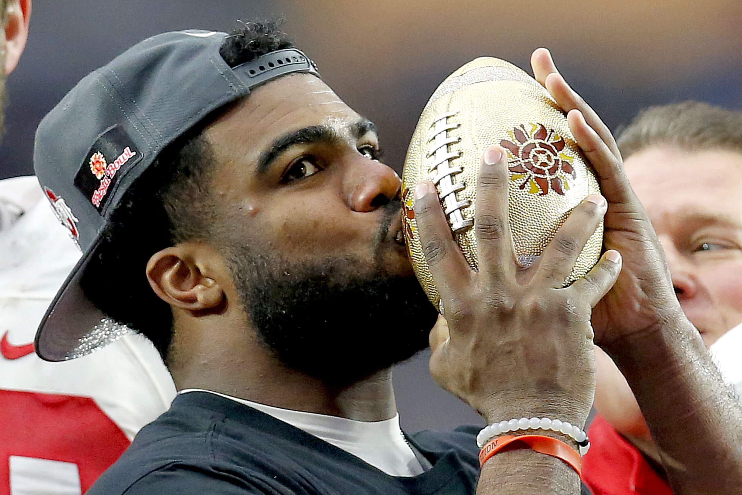 Ohio State running back Ezekiel Elliott kisses the trophy after their 44-28 win over Notre Dame in the Fiesta Bowl NCAA college football game. Friday, Jan. 1, 2016, in Glendale, Ariz. (AP Photo/Rick Scuteri) Ohio State running back Ezekiel Elliott kisses the trophy after their 44-28 win over Notre Dame in the Fiesta Bowl NCAA college football game. Friday, Jan. 1, 2016, in Glendale, Ariz. (AP Photo/Rick Scuteri)