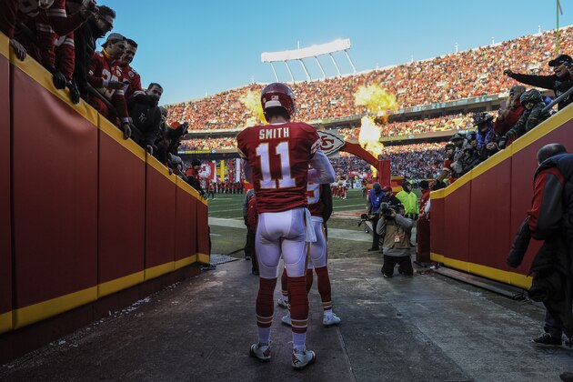 Kansas City Chiefs quarterback Alex Smith (11) prepares to enter the field for the start of his NFL football game against the Oakland Raiders in Kansas City, Mo., Sunday, Jan, 3, 2016. (AP Photo/Reed Hoffmann)