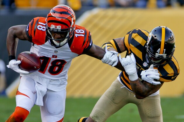 Cincinnati Bengals wide receiver A.J. Green (18) makes a catch as Pittsburgh Steelers cornerback Antwon Blake (41) defends during an NFL football game against the Pittsburgh Steelers, Sunday, Nov. 1, 2015, in Pittsburgh. (AP Photo/Gene J. Puskar)