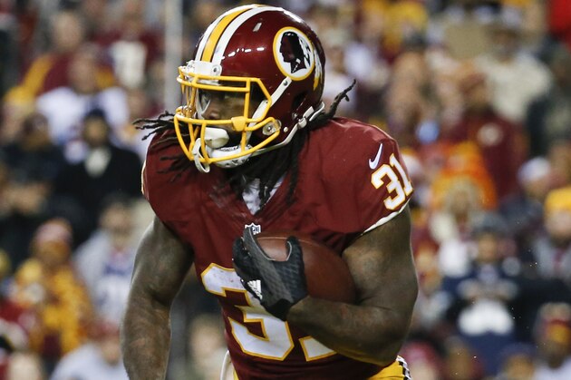 Washington Redskins running back Matt Jones (31) carries the ball during the first half of an NFL football game against the Dallas Cowboys in Landover, Md., Monday, Dec. 7, 2015. (AP Photo/Alex Brandon)